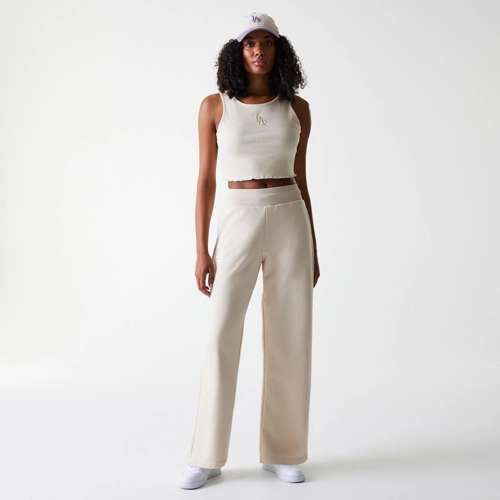The Female model is wearing LA Dodgers Womens MLB Tonal Light Beige Straight Leg Joggers 8
