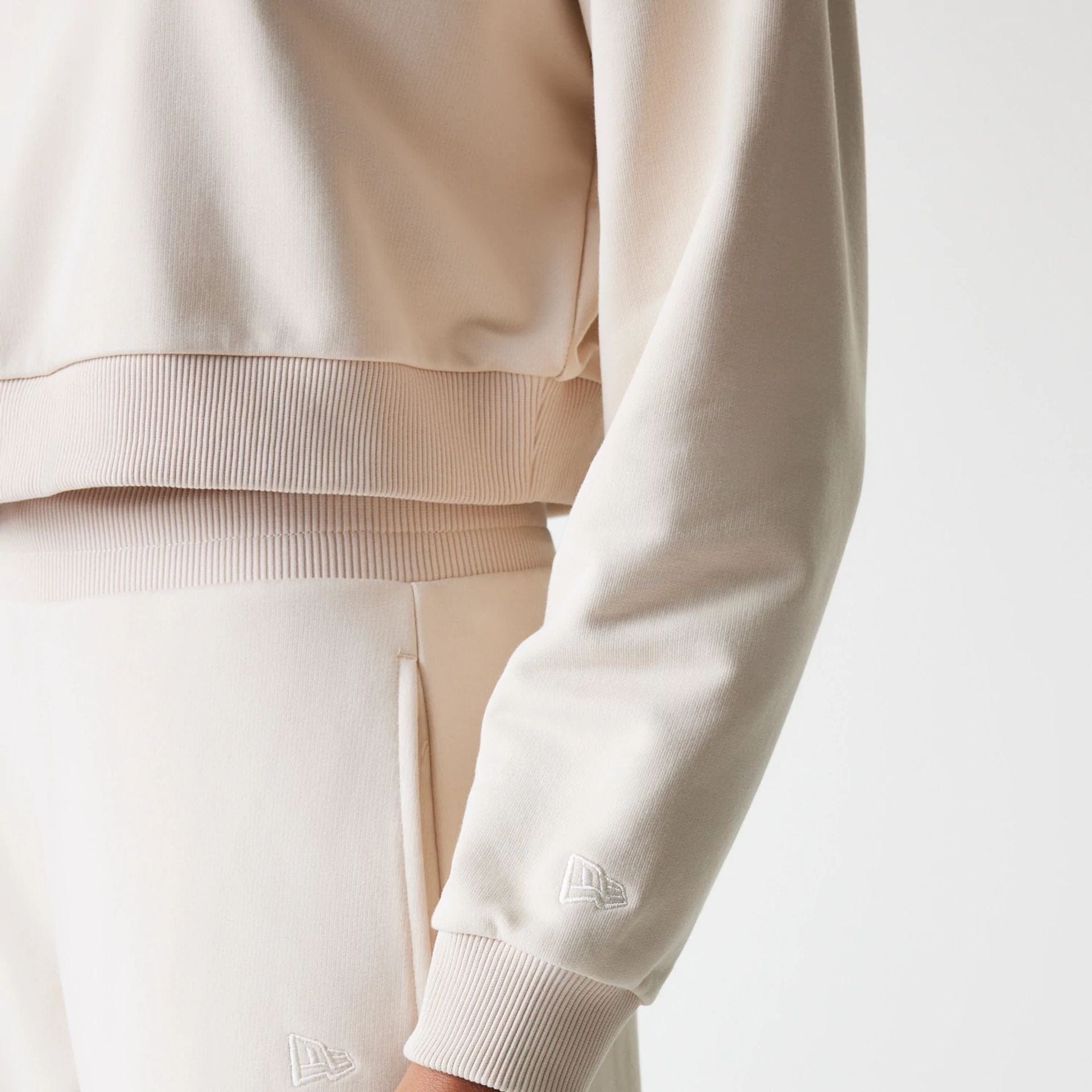 The Female model is wearing LA Dodgers Womens MLB Tonal Light Beige Cropped 1/4 Zip Sweater 5