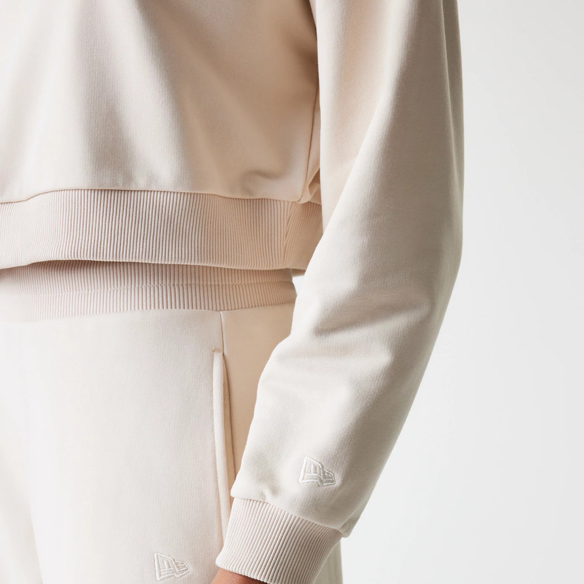 The Female model is wearing LA Dodgers Womens MLB Tonal Light Beige Cropped 1/4 Zip Sweater 5