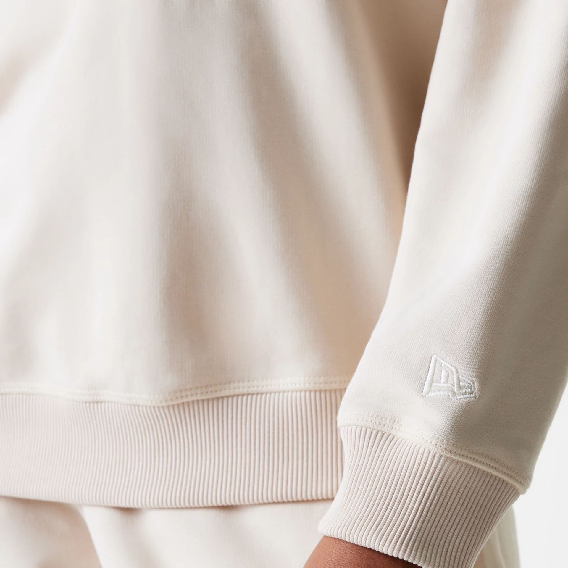 The Female model is wearing LA Dodgers Womens MLB Tonal Graphic Light Beige Oversized Crew Neck Sweater 5