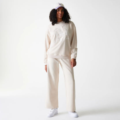 The Female model is wearing LA Dodgers Womens MLB Tonal Graphic Light Beige Oversized Crew Neck Sweater 8