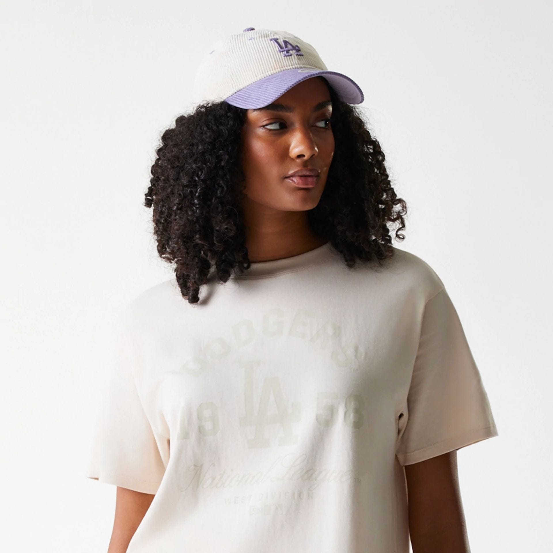 The Female model is wearing LA Dodgers Womens MLB Tonal Graphic Light Beige Oversized T-Shirt 6
