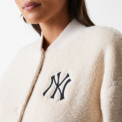 The Female model is wearing New York Yankees Womens MLB Light Beige Oversized Sherpa Bomber Jacket 5