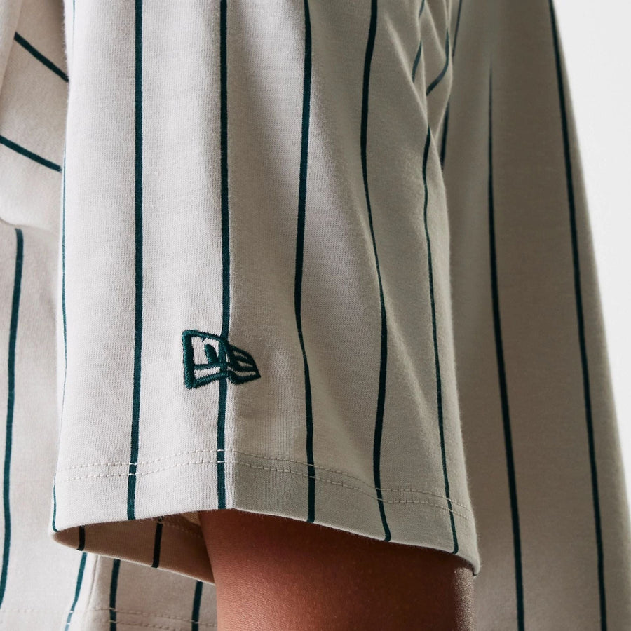 The Female model is wearing Womens New Era Pinstripe Light Beige Crop T-Shirt 7