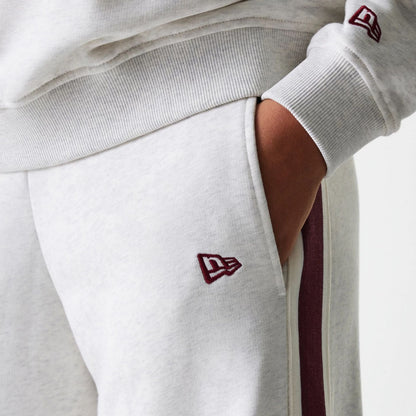 The Female model is wearing Womens New Era Pastel Grey Straight Leg Joggers 4