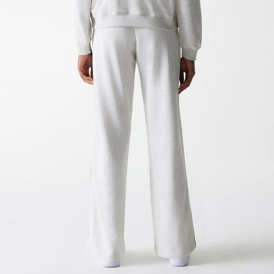 The Female model is wearing Womens New Era Pastel Grey Straight Leg Joggers 2