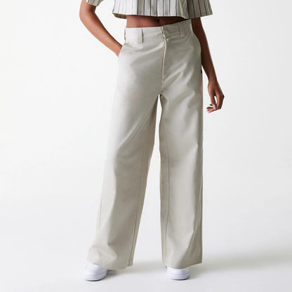 The Female model is wearing Womens New Era Light Beige Wide Leg Chino Trousers 1