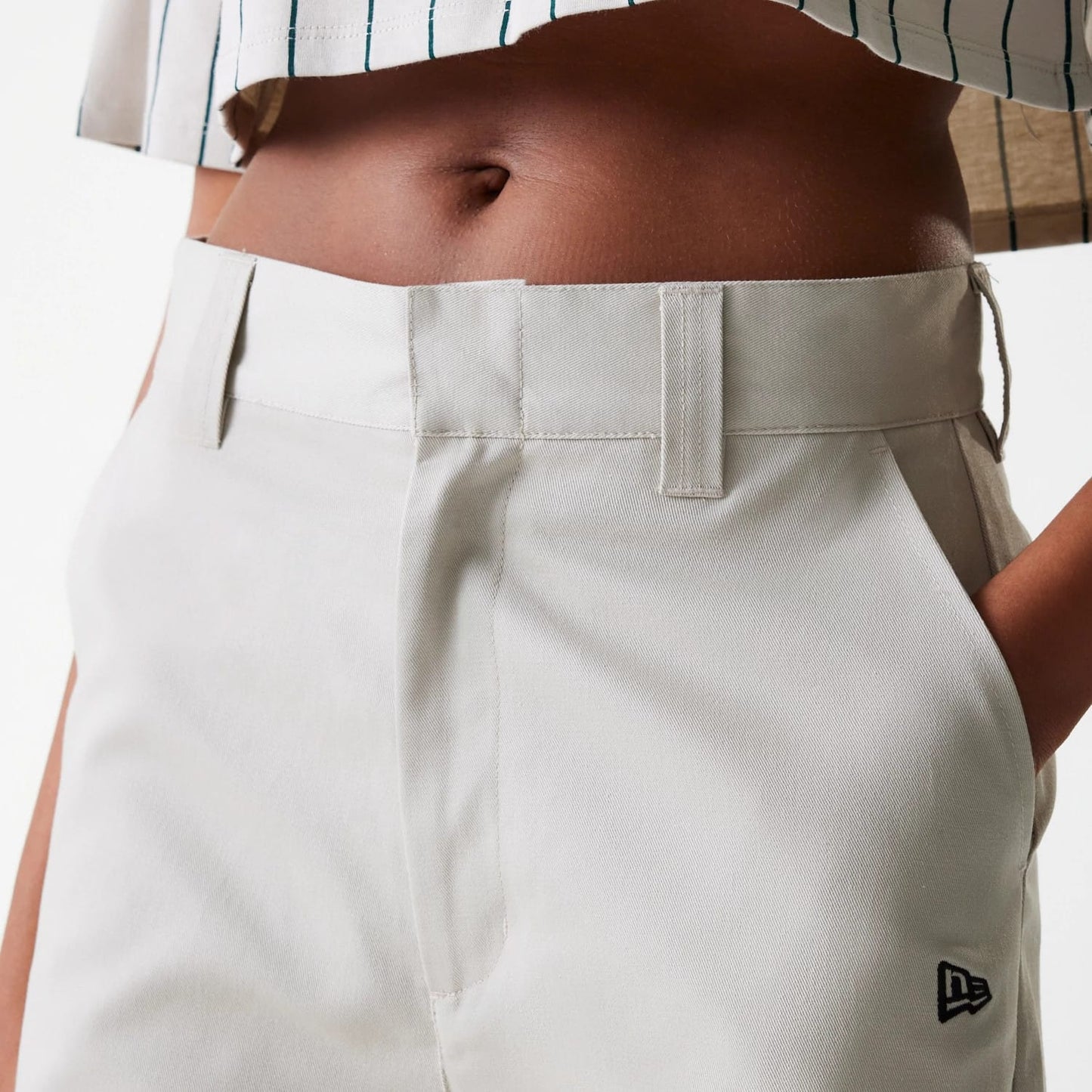 The Female model is wearing Womens New Era Light Beige Wide Leg Chino Trousers 5