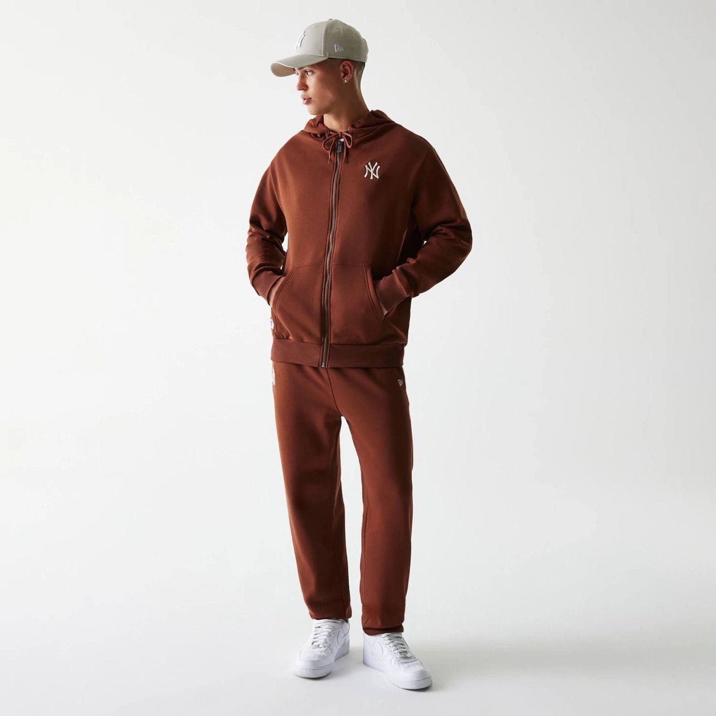 The Male model is wearing New York Yankees MLB Midi League Essential Brown Oversized Full Zip Hoodie 8