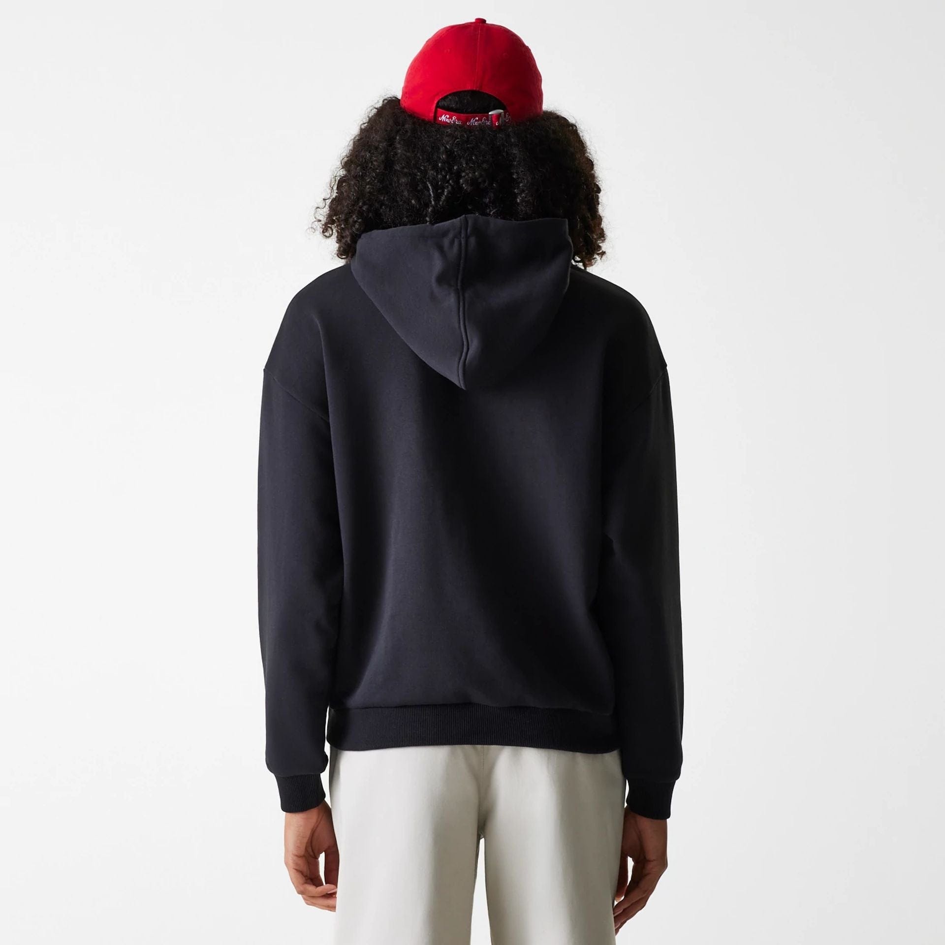 The Female model is wearing Womens New Era Crest Black Pullover Hoodie 2