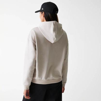 The Female model is wearing Womens New Era Crest Light Beige Pullover Hoodie 2