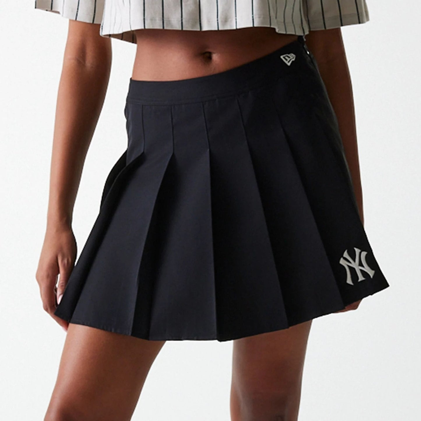 The Female model is wearing New York Yankees Womens MLB Black Tennis Skirt 3