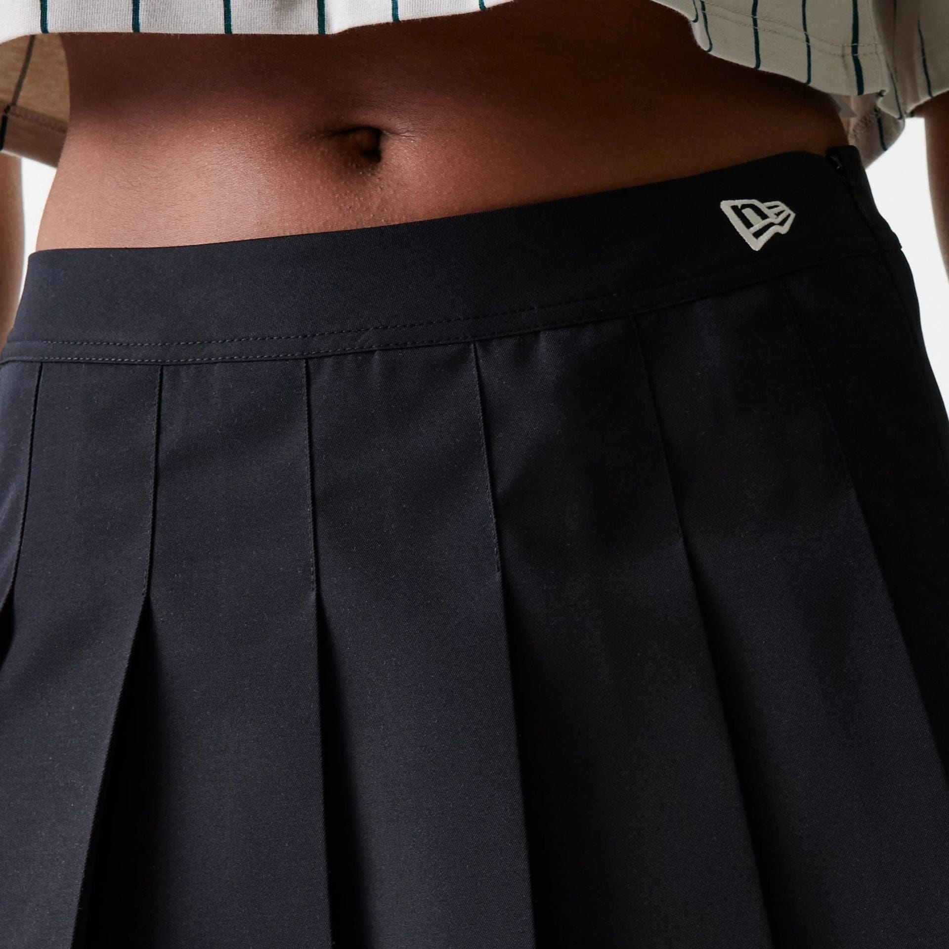 The Female model is wearing New York Yankees Womens MLB Black Tennis Skirt 6