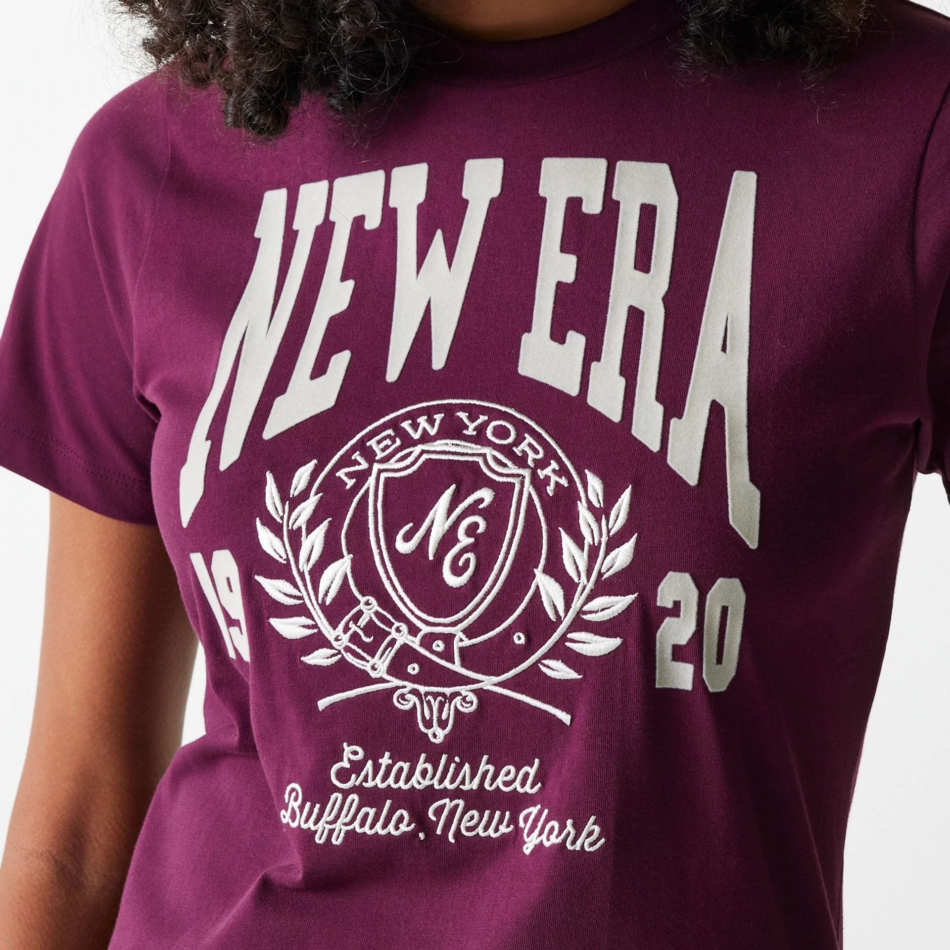 The Female model is wearing Womens New Era Crest Dark Red T-Shirt 4