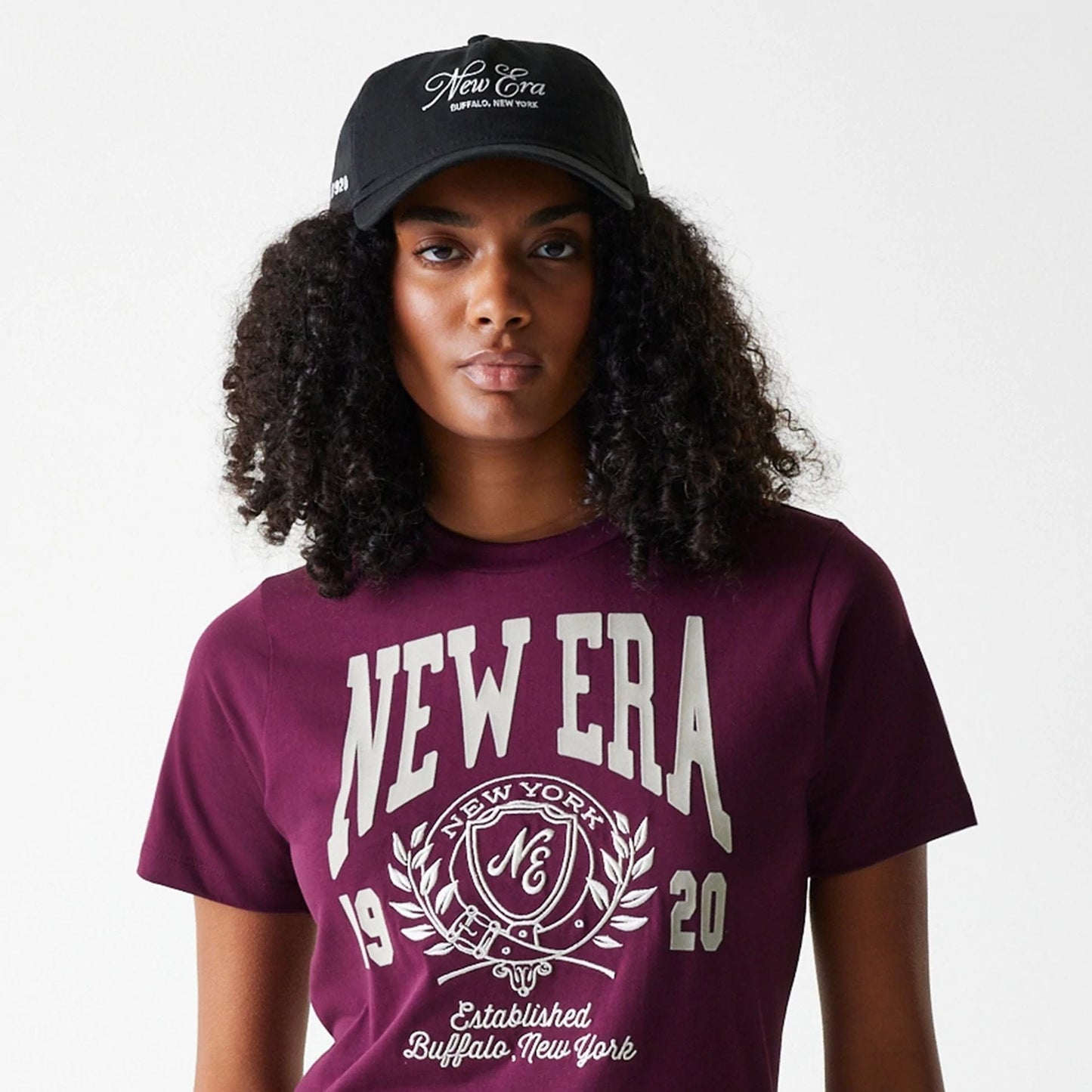 The Female model is wearing Womens New Era Crest Dark Red T-Shirt 5