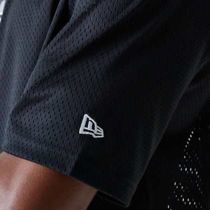 The Male model is wearing Las Vegas Raiders NFL Essentials Black Oversized Mesh T-Shirt 5