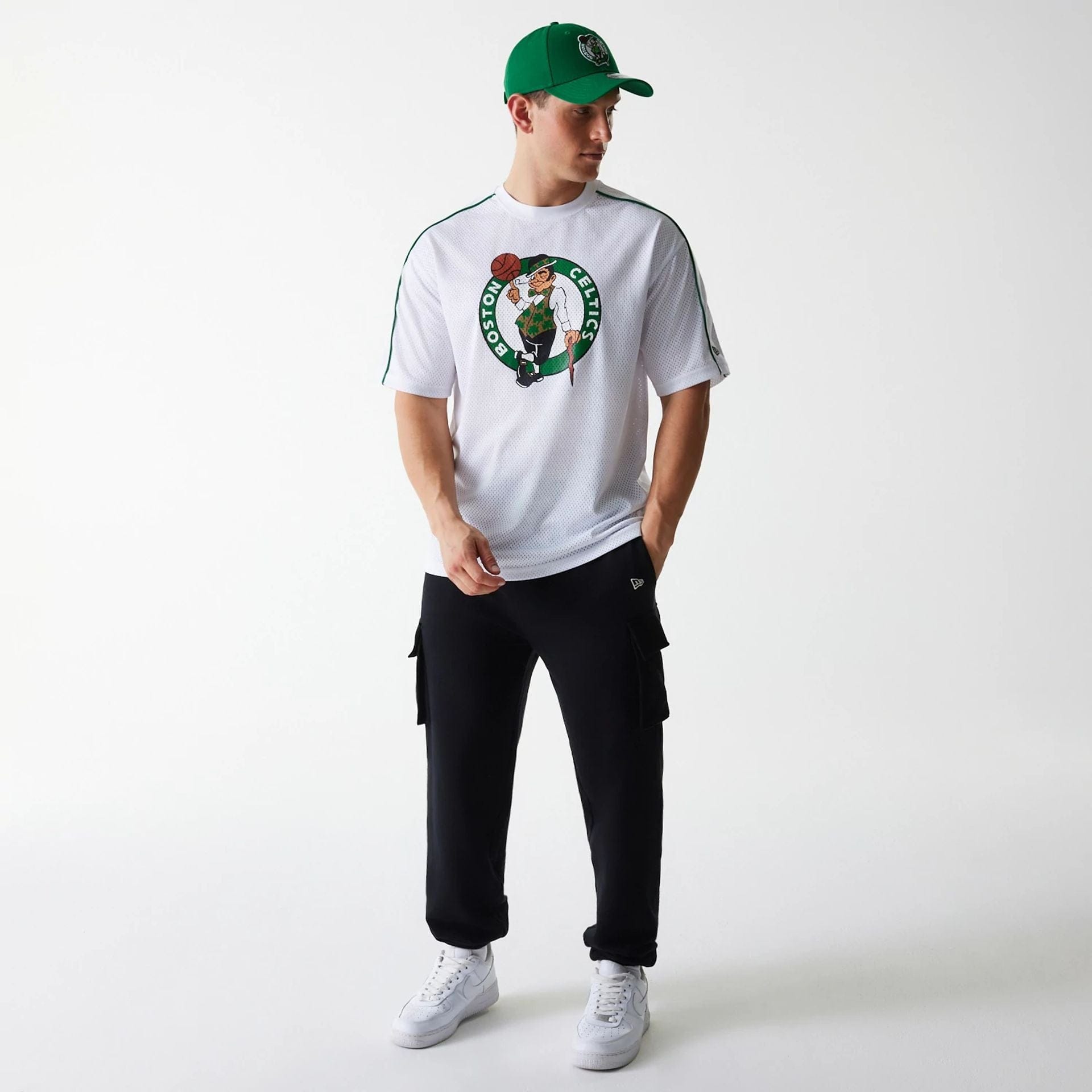 The Male model is wearing Boston Celtics NBA Piping White Oversized Mesh T-Shirt 8