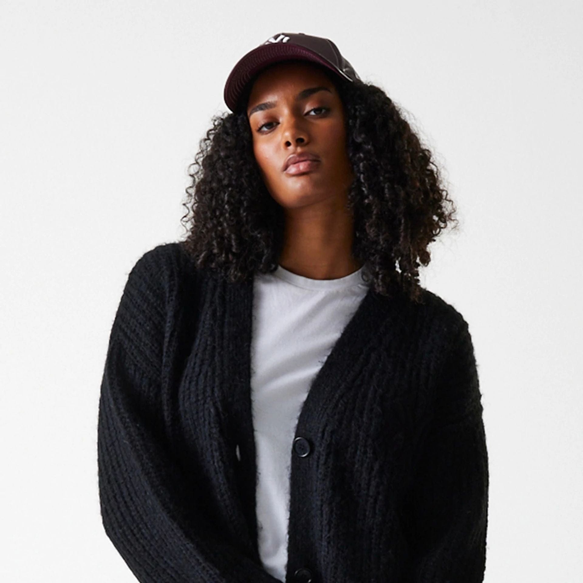 The Female model is wearing New York Yankees Womens MLB Knit Black Cardigan 6