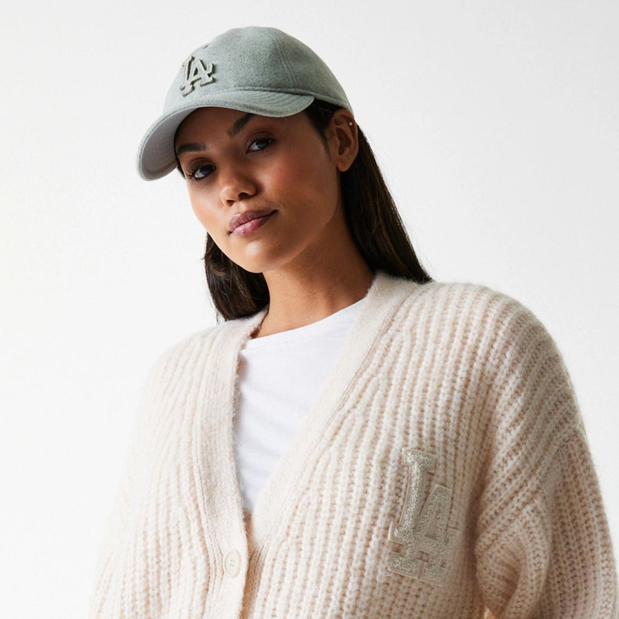 The Female model is wearing LA Dodgers Womens MLB Knit Light Beige Cardigan 6