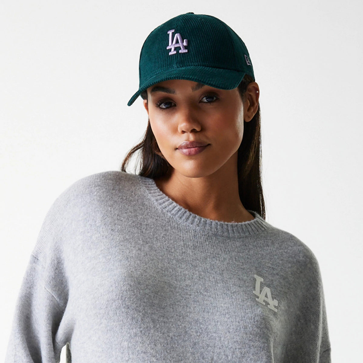 The Female model is wearing LA Dodgers Womens MLB Knit Grey Crew Neck Sweater 4