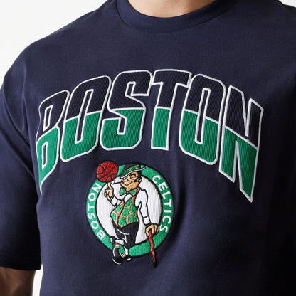 The Male model is wearing Boston Celtics NBA Arch Graphic Navy Oversized T-Shirt 5