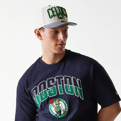 The Male model is wearing Boston Celtics NBA Arch Graphic Navy Oversized T-Shirt 4