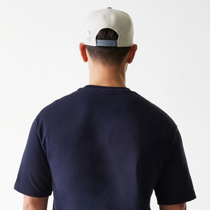 The Male model is wearing Boston Celtics NBA Arch Graphic Navy Oversized T-Shirt 7