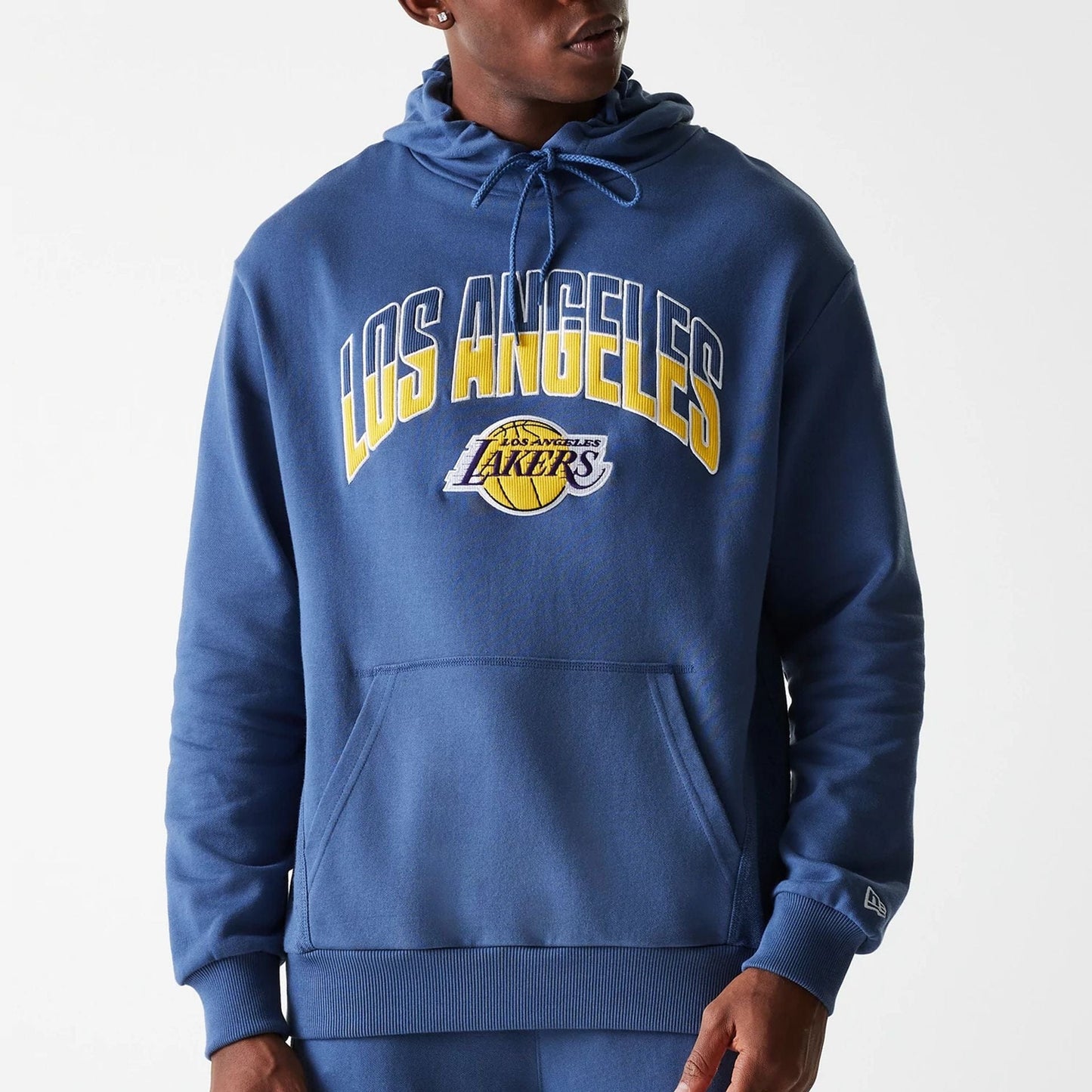 The Male model is wearing LA Lakers NBA Arch Graphic Dark Blue Oversized Pullover Hoodie 5