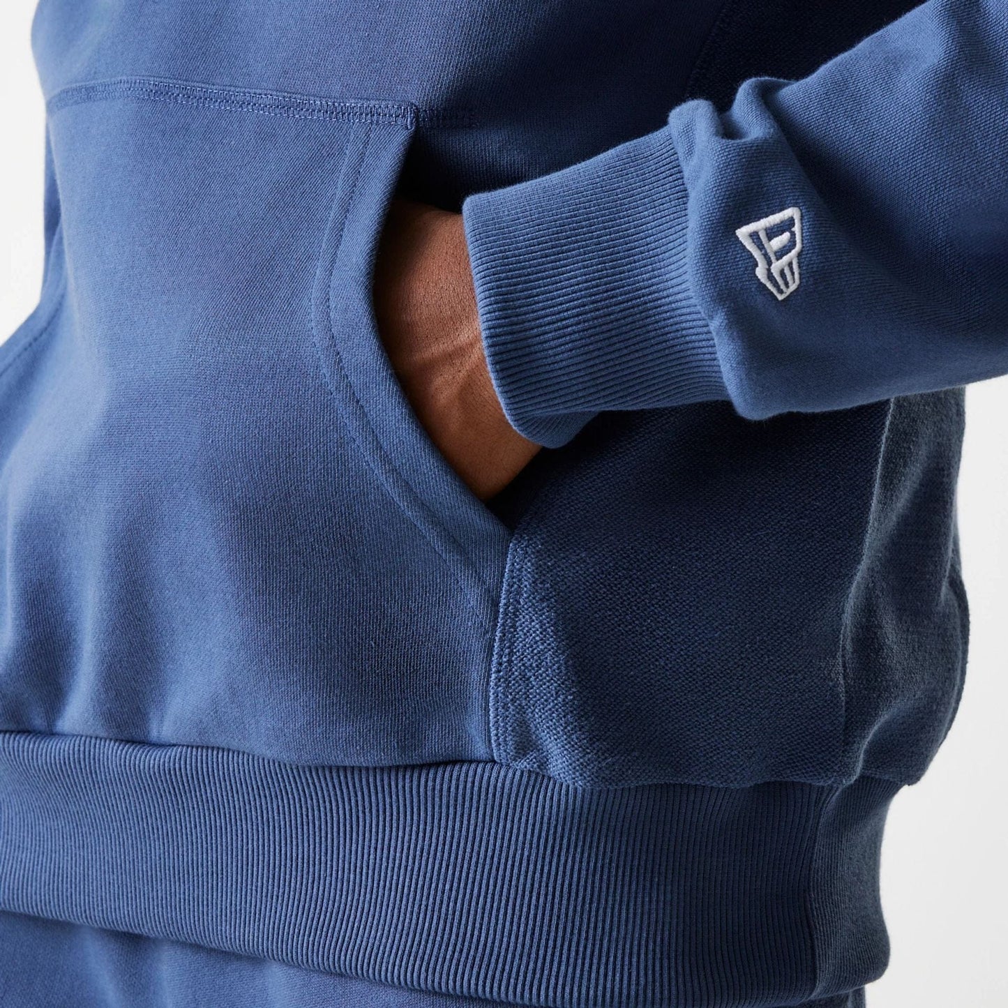 The Male model is wearing LA Lakers NBA Arch Graphic Dark Blue Oversized Pullover Hoodie 7