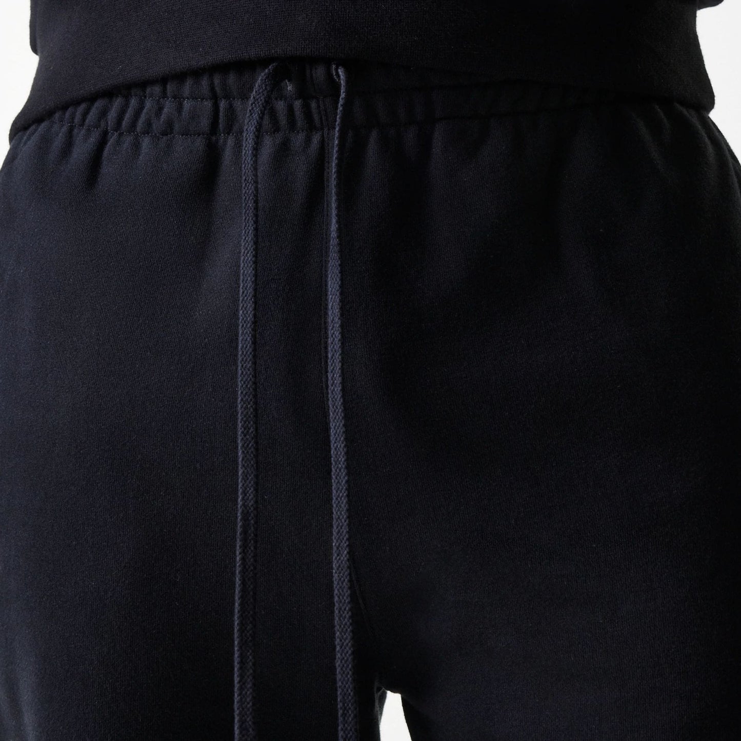 The Male model is wearing New York Yankees MLB Heritage Black Joggers 6