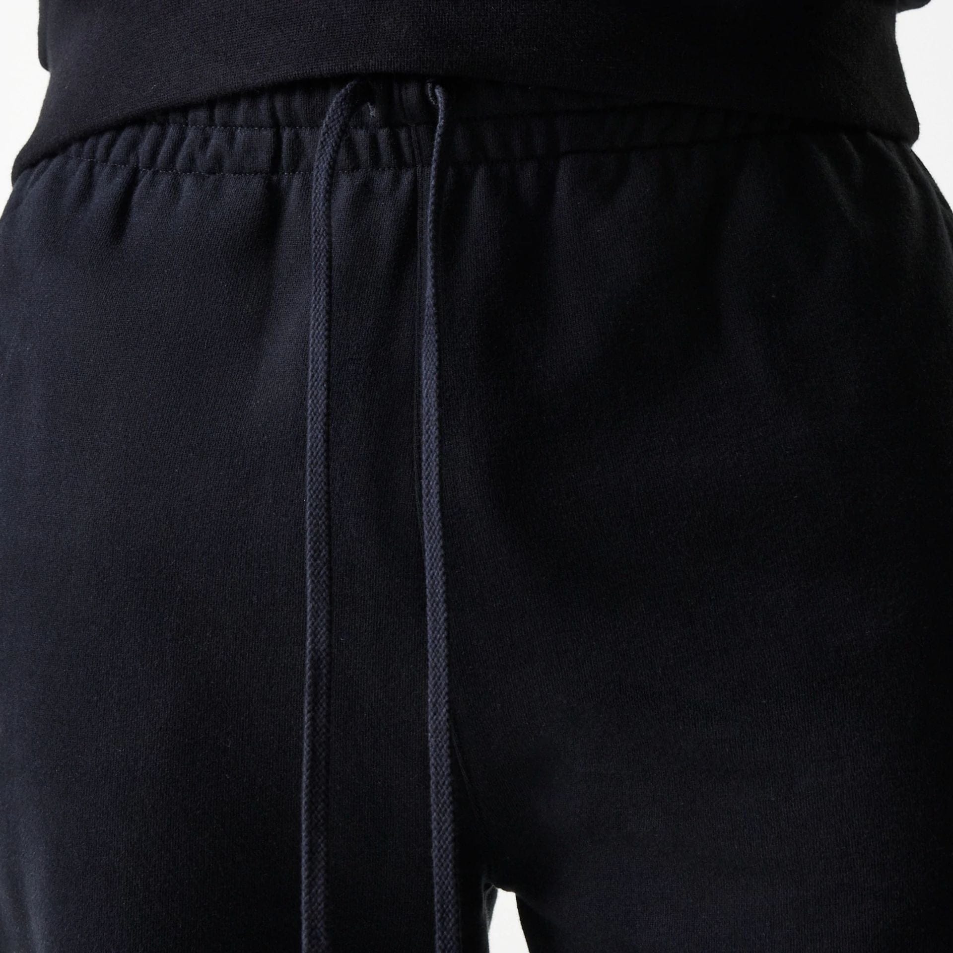 The Male model is wearing New York Yankees MLB Heritage Black Joggers 6