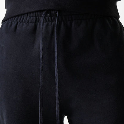 The Male model is wearing New York Yankees MLB Heritage Black Joggers 6