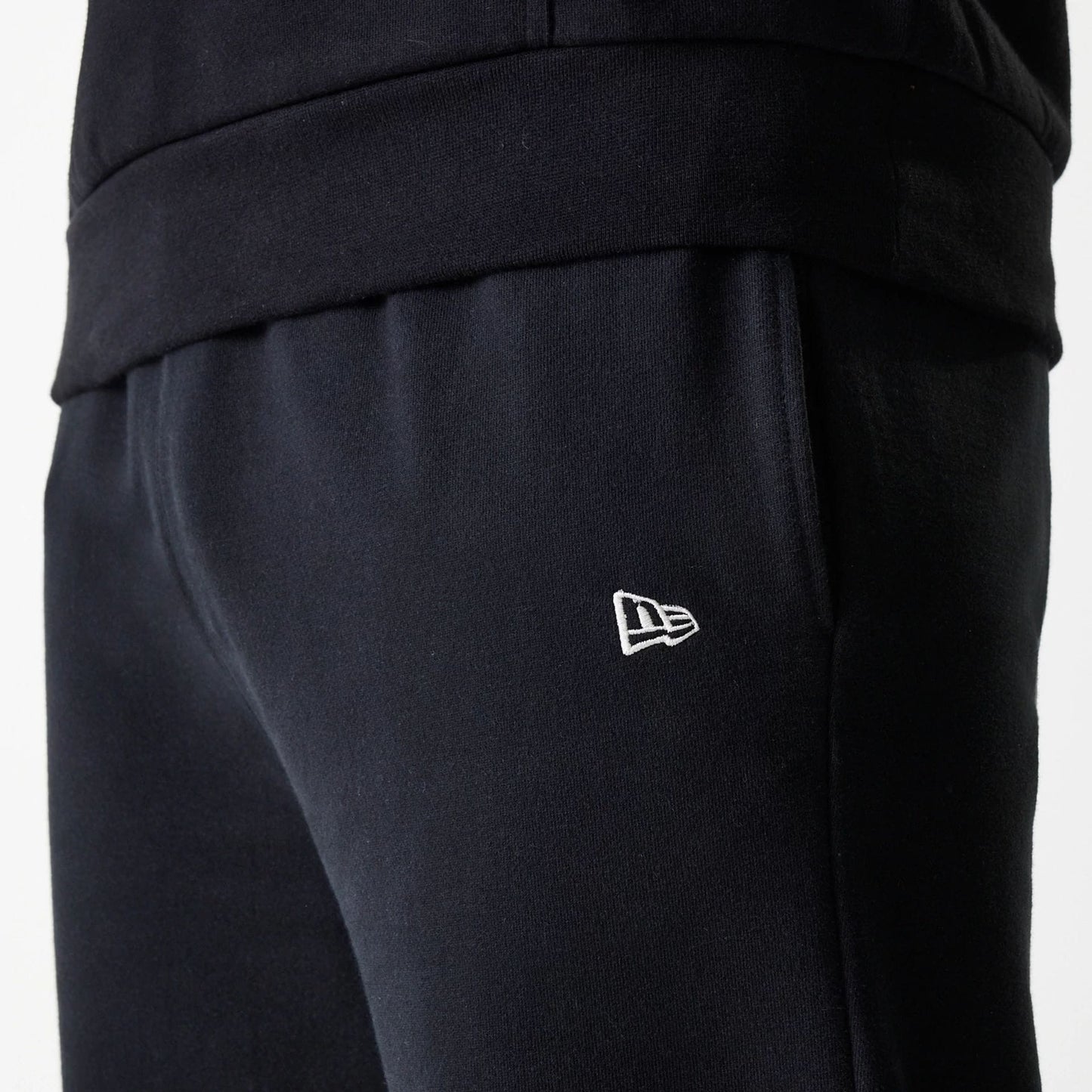 The Male model is wearing New York Yankees MLB Heritage Black Joggers 4