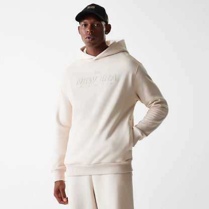 The Male model is wearing New Era Tech Light Beige Oversized Pullover Hoodie 3
