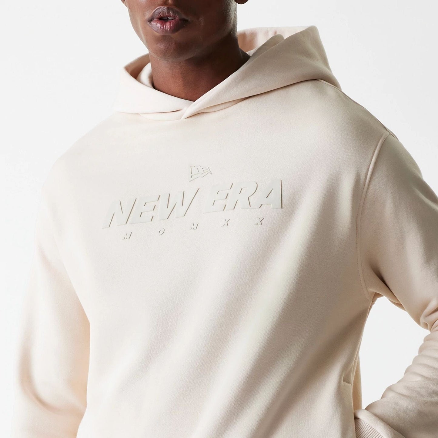 The Male model is wearing New Era Tech Light Beige Oversized Pullover Hoodie 5