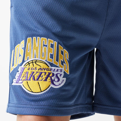 The Male model is wearing LA Lakers NBA Arch Graphic Dark Blue Mesh Shorts 6