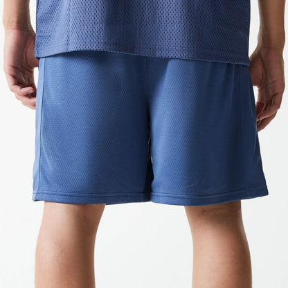 The Male model is wearing LA Lakers NBA Arch Graphic Dark Blue Mesh Shorts 7