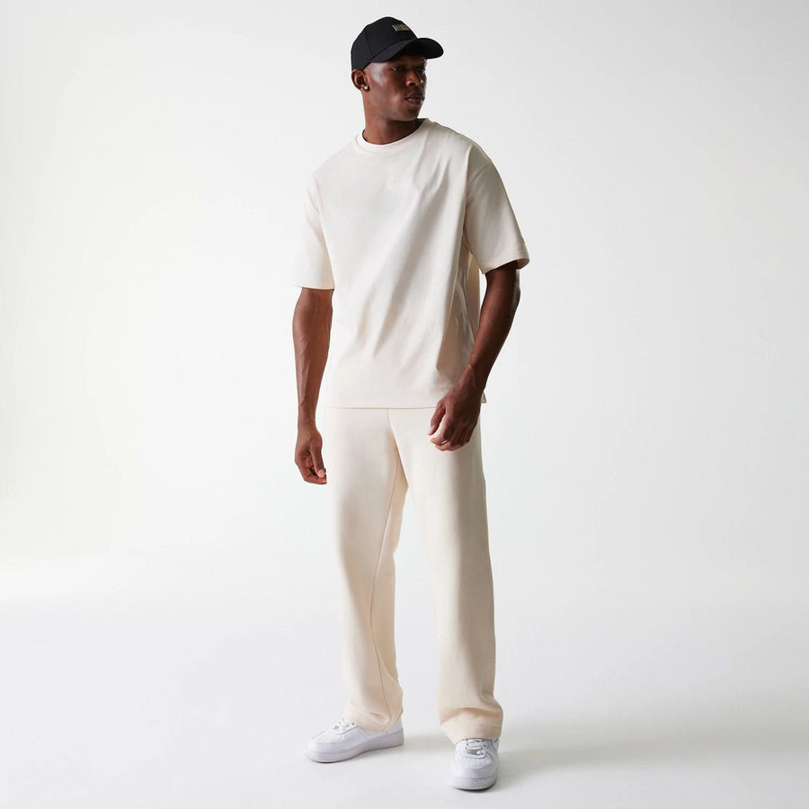 The Male model is wearing New Era Light Beige Straight Leg Joggers 3