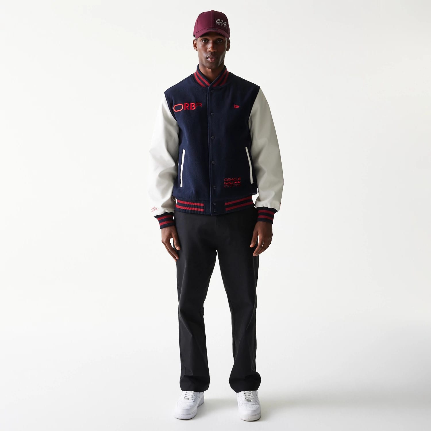 The Male model is wearing Red Bull Racing Dark Blue Varsity Jacket 7