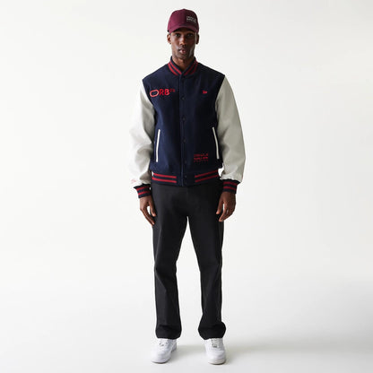 The Male model is wearing Red Bull Racing Dark Blue Varsity Jacket 7