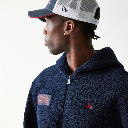 The Male model is wearing Red Bull Racing Dark Blue Hooded Sherpa Jacket 3