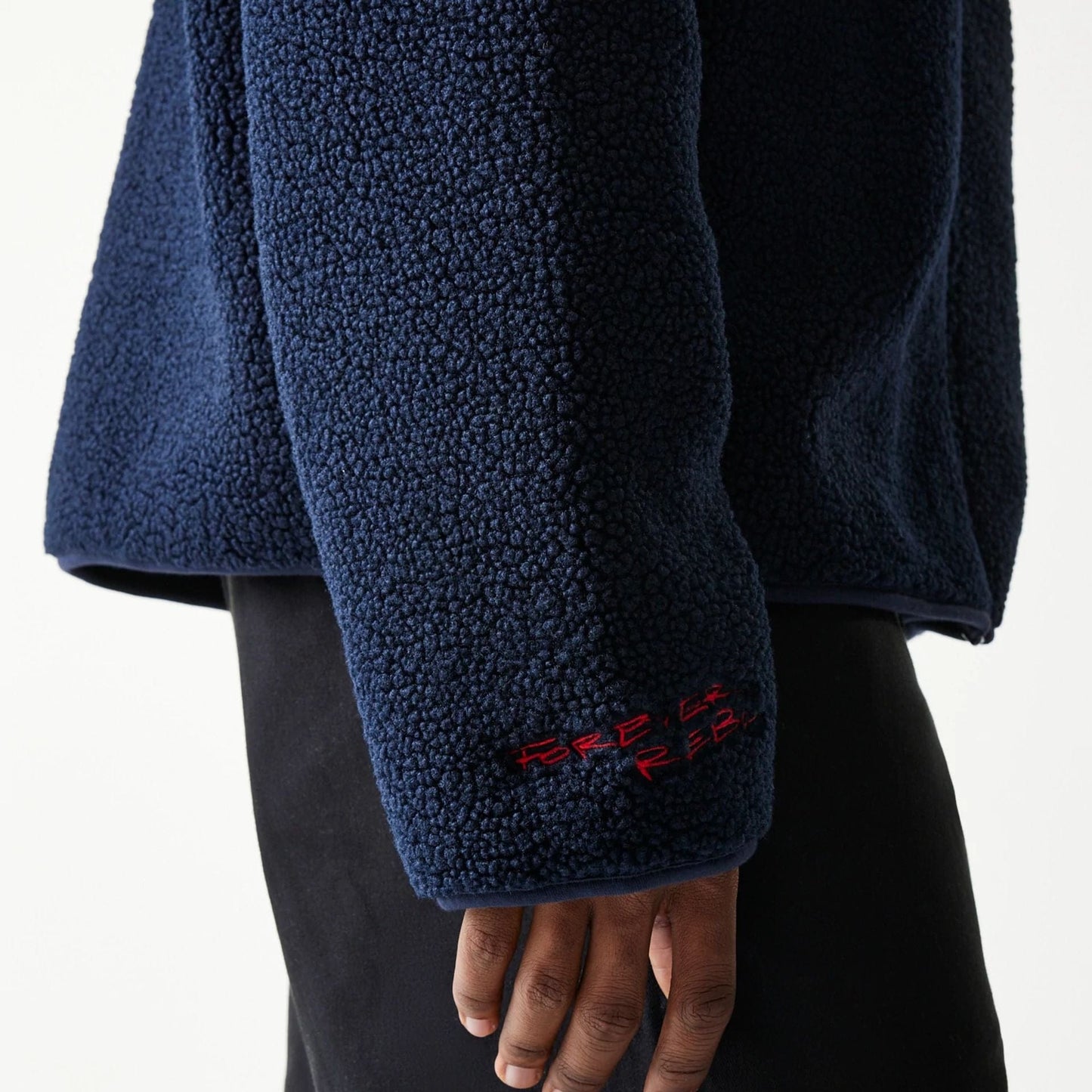 The Male model is wearing Red Bull Racing Dark Blue Hooded Sherpa Jacket 5