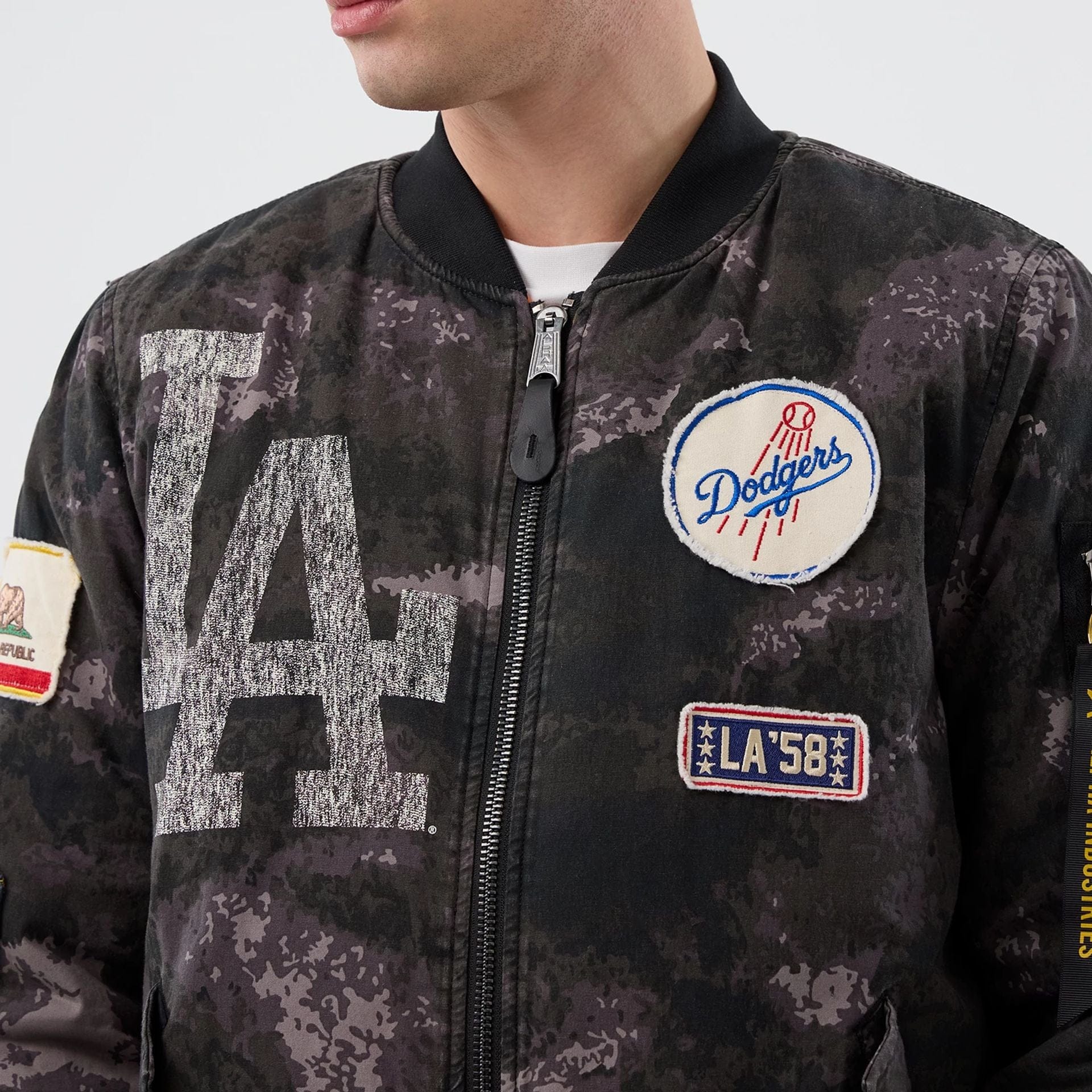 The Male model is wearing LA Dodgers MLB X Alpha Black Bomber Jacket 5