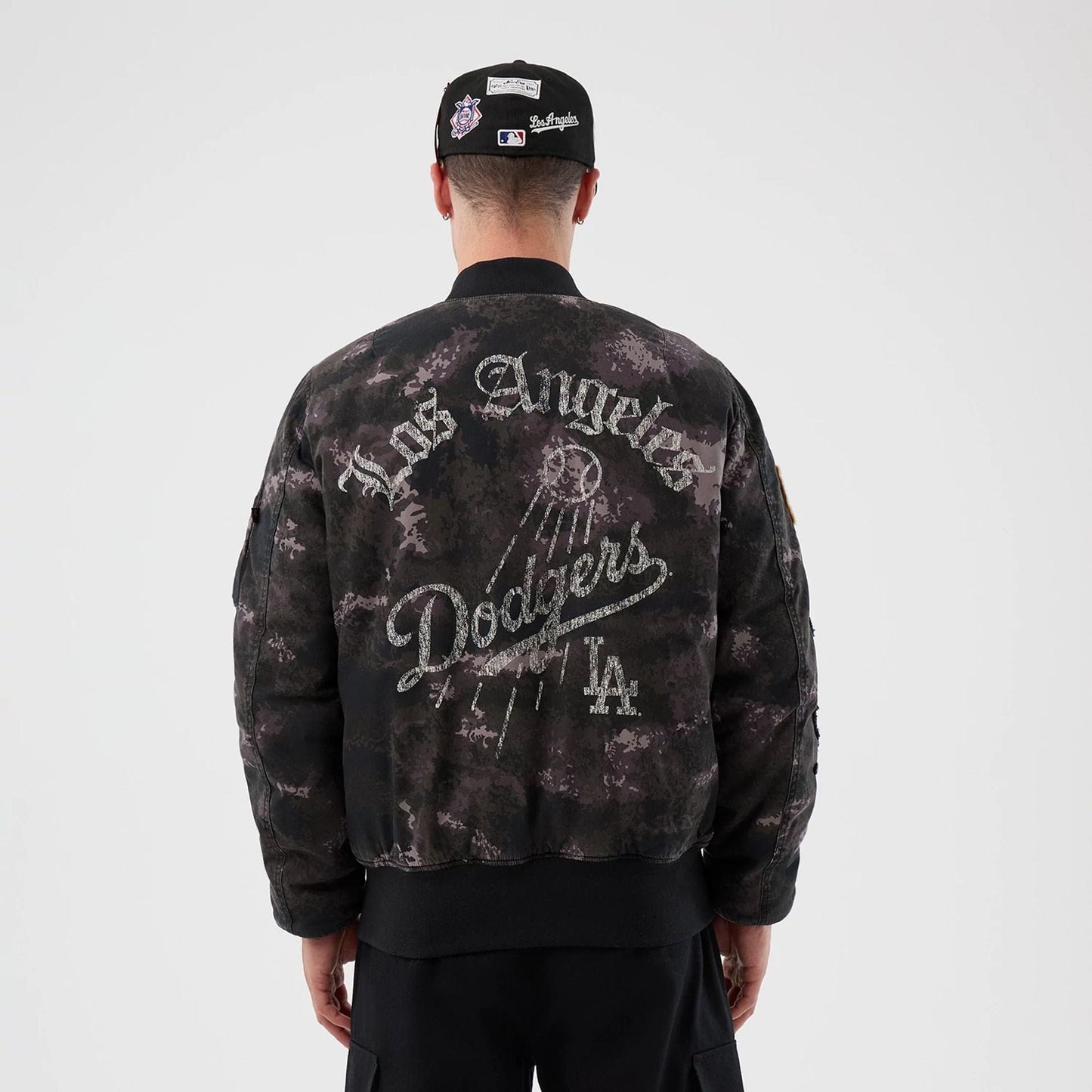 The Male model is wearing LA Dodgers MLB X Alpha Black Bomber Jacket 2