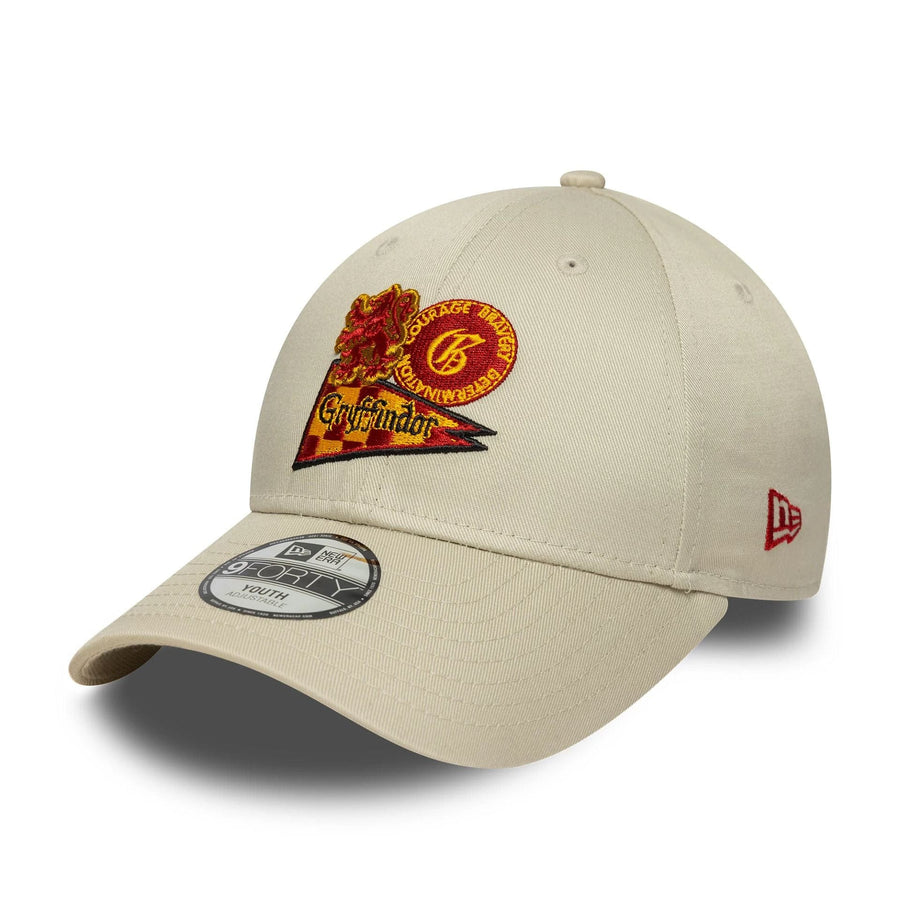 This is a Harry Potter Gryffindor Youth Warner Brothers Cream 9FORTY Adjustable Cap 1