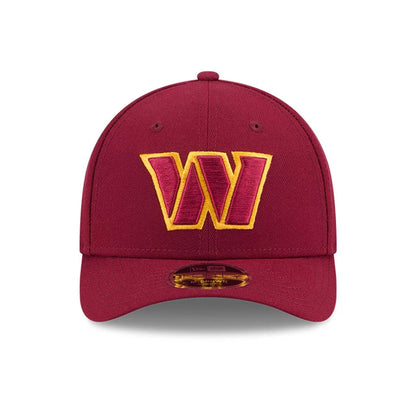 Pictured is this NFL Team Washington Commanders 9FORTY M-Crown cap in dark red. 3
