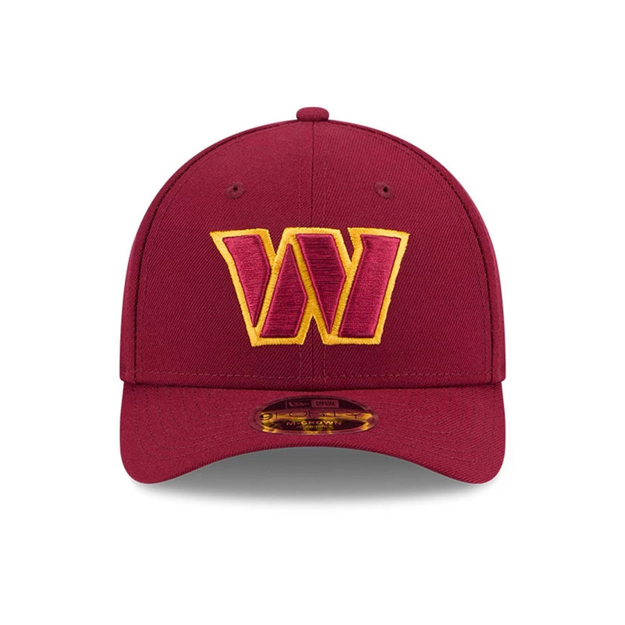 Pictured is this NFL Team Washington Commanders 9FORTY M-Crown cap in dark red. 3