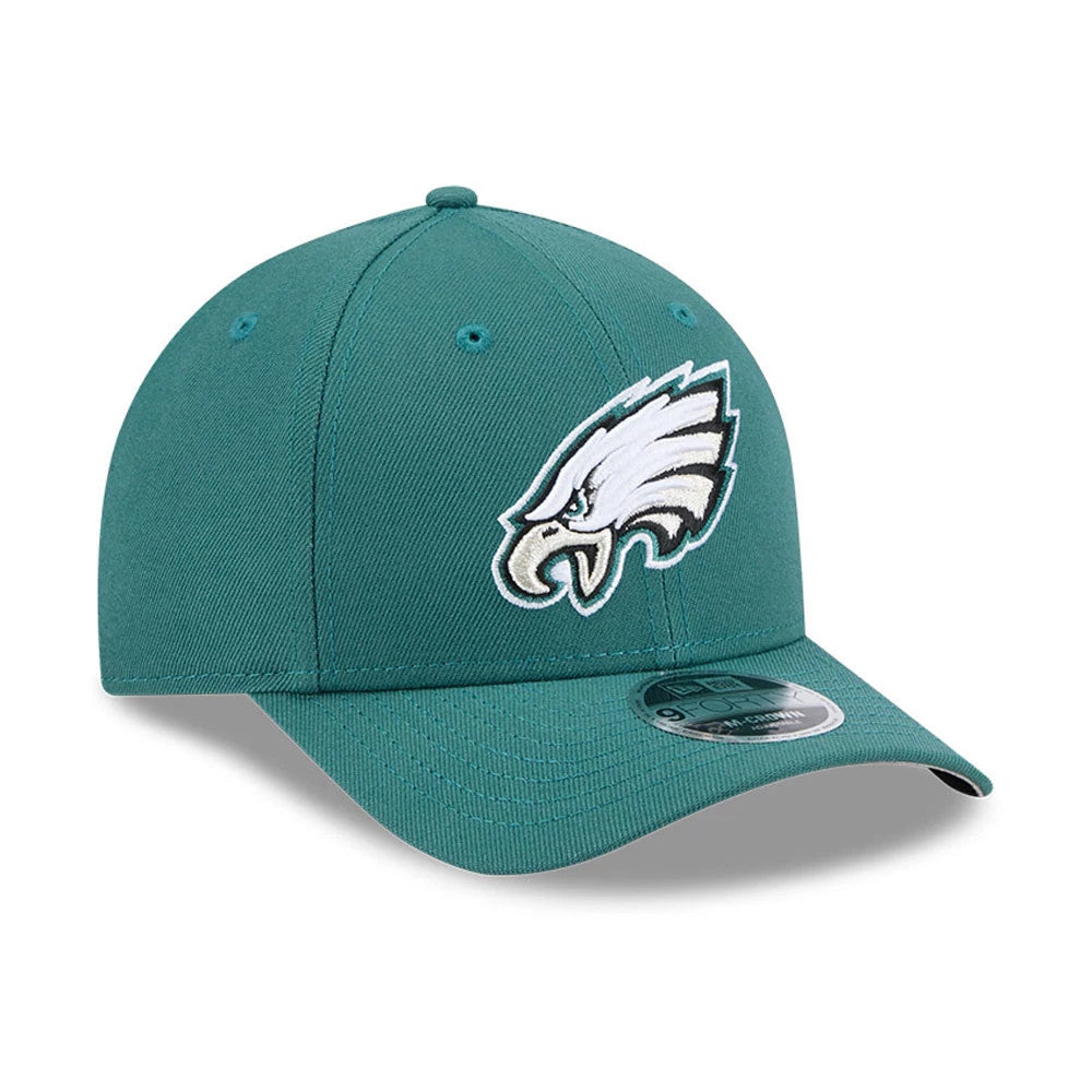 Philadelphia Eagles NFL Team Dark Green New Era 9FORTY M-Crown Cap, three-quarter view showing the raised embroidered eagle logo on the front panel, curved visor with 9FORTY size sticker, and matching dark green top button.