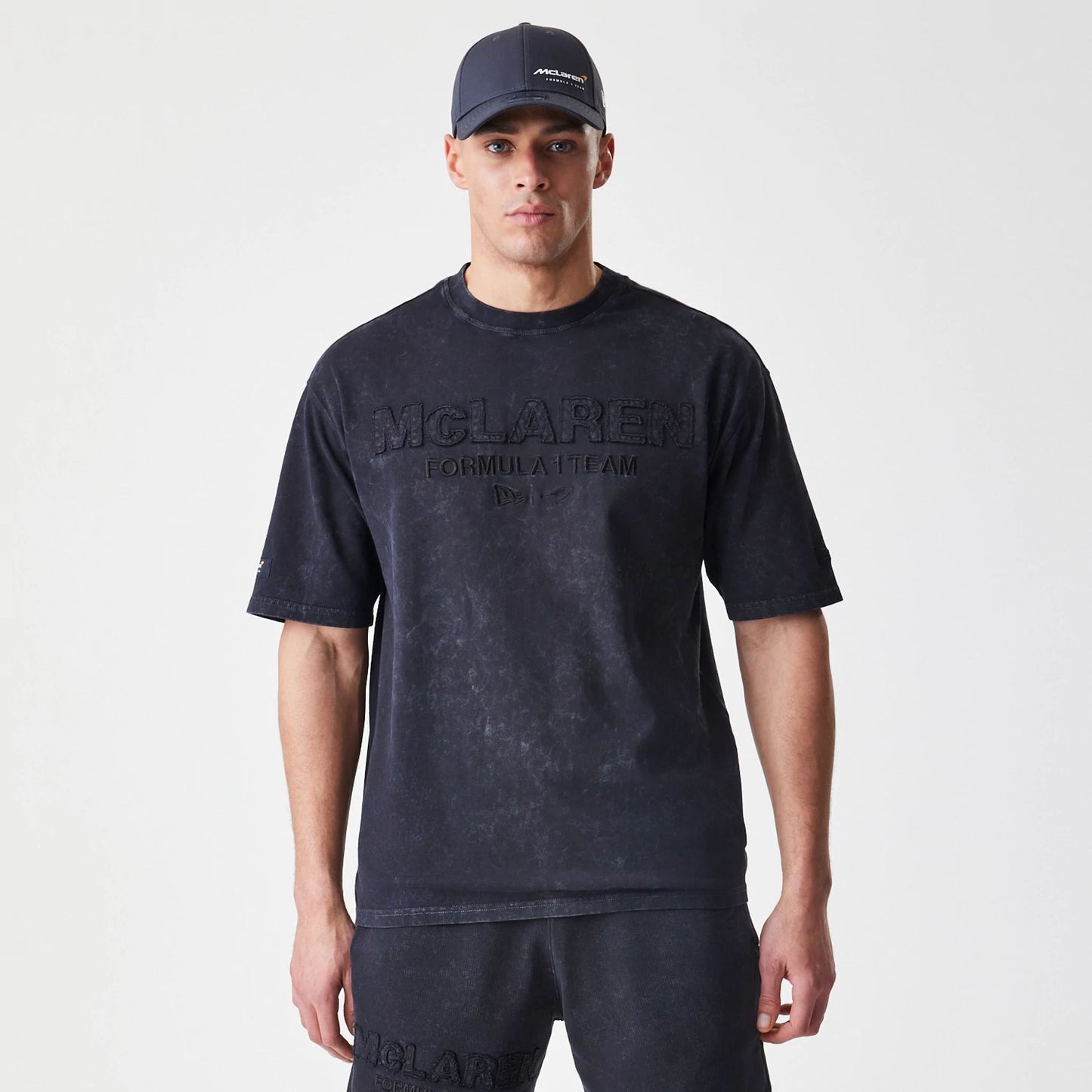 The Male model is wearing McLaren Racing Washed Black Oversized T-Shirt  9