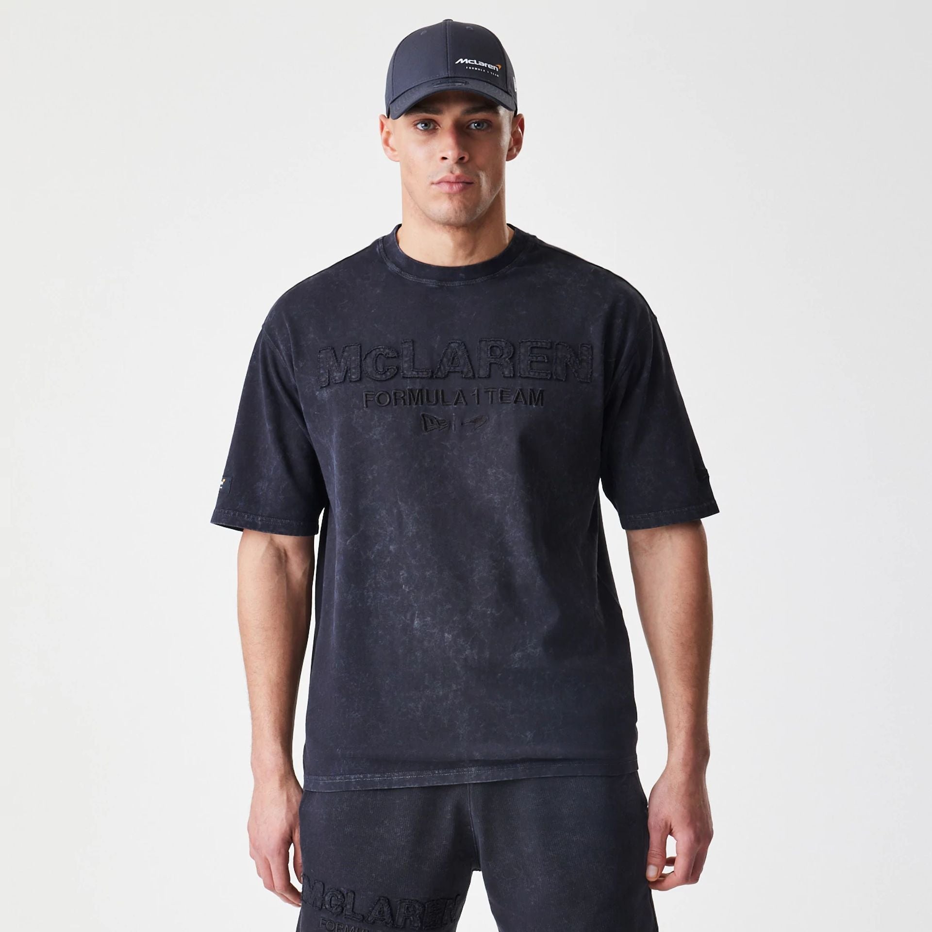 The Male model is wearing McLaren Racing Washed Black Oversized T-Shirt  9